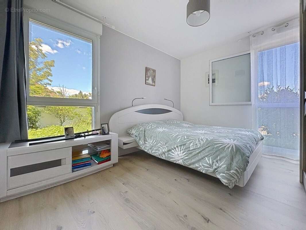 Appartement à vendre 4 pièces en rez de jardin VULBENS - photo 4