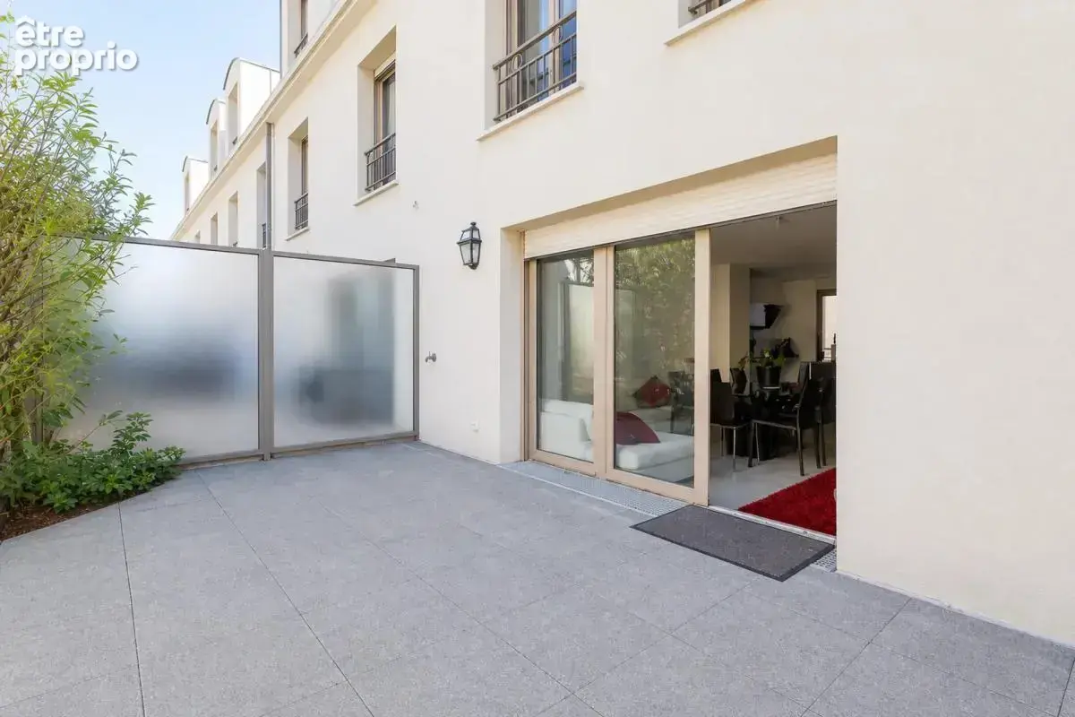 LE RAINCY - Maison de type T4 de 94 m² avec cave, box , jardin - photo 13