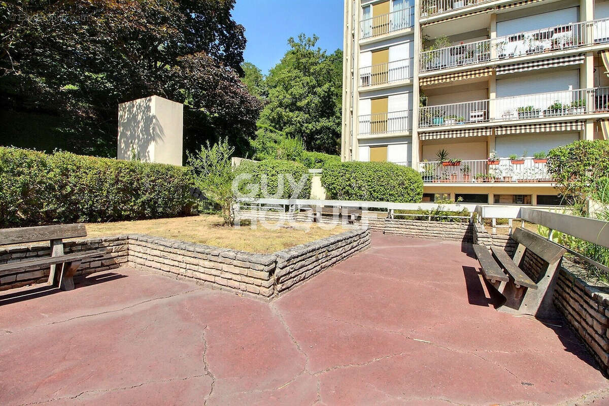 Appartement 4 pièces de 94 m² en rez-de-jardin - photo 11
