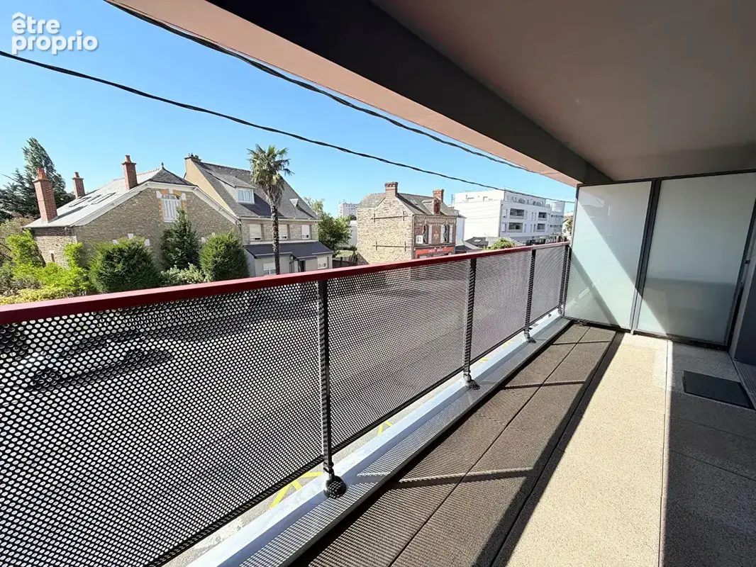 T2 avec terrasse et garage rue de nantes - photo 2