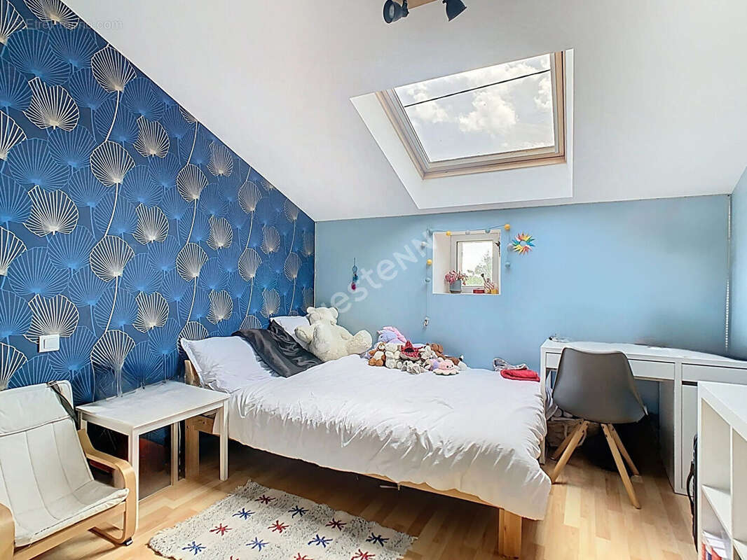 Venez découvrir cette magnifique maison en pierres apparentes, nichée dans un écrin de verdure, à seulement 5 km de l'axe Nantes - photo 10
