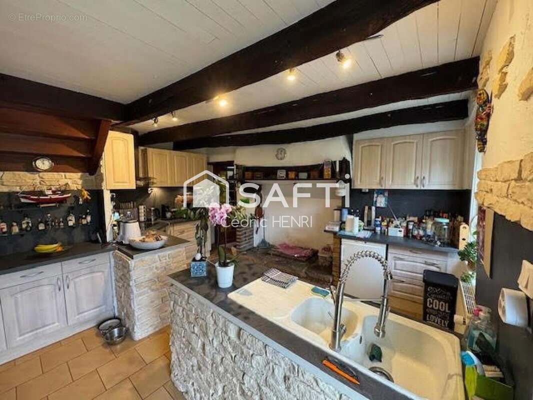 Photo 2 - Maison à CHATEAUNEUF-DU-FAOU