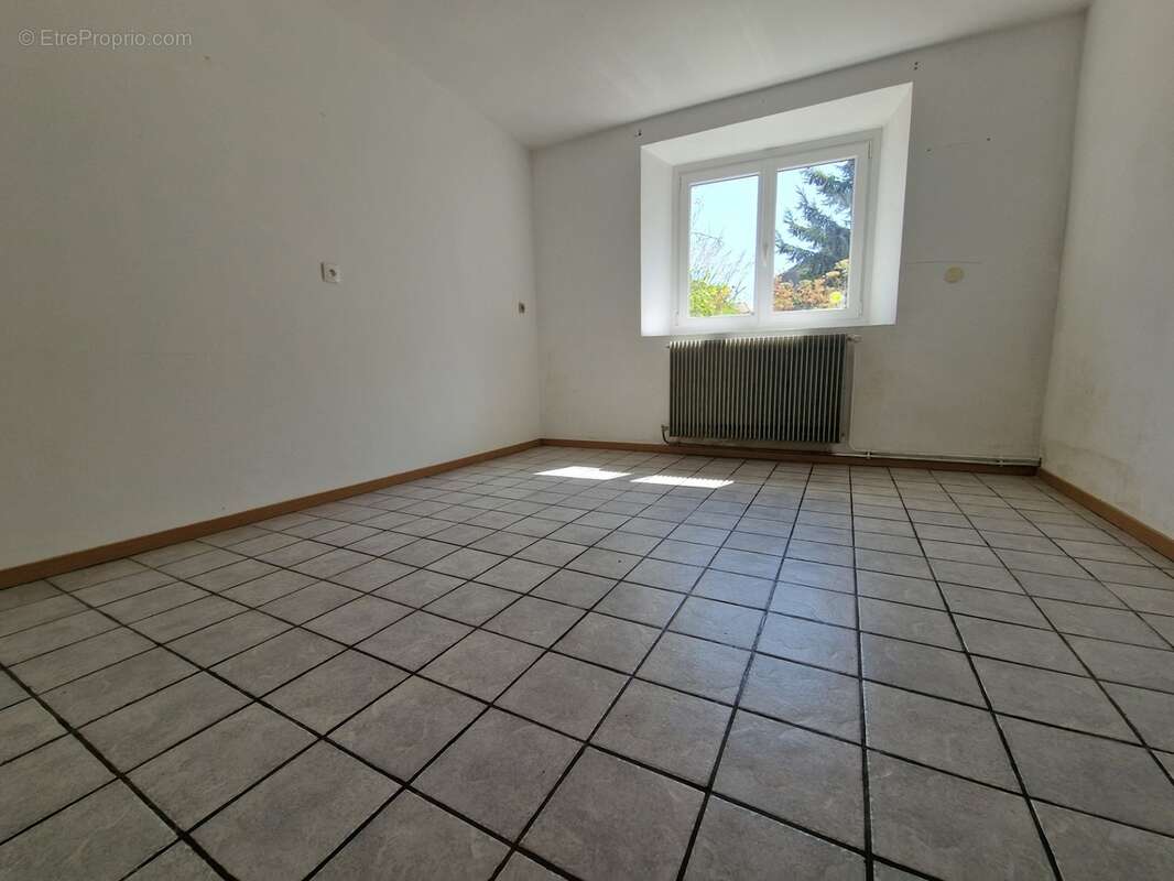 Appartement à vendre 3 pièces en rez-de-jardin proche de EPINAL (88) avec TERRASSE et TERRAIN - photo 10