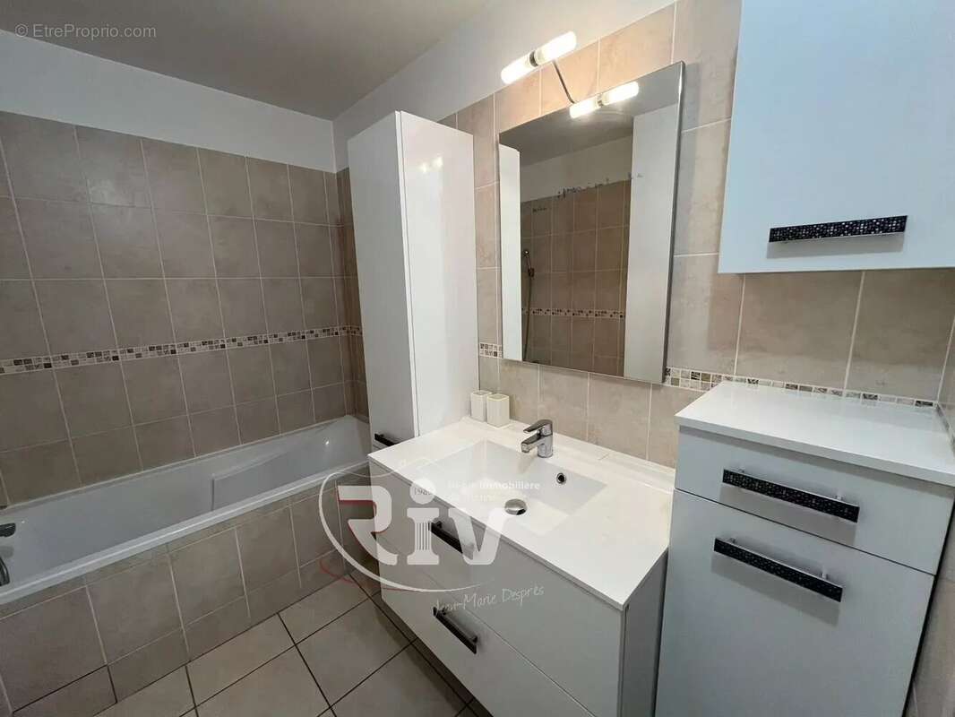 Appartement 3 pièces en plein cœur du centre-ville – Garage, parking et cave - photo 8
