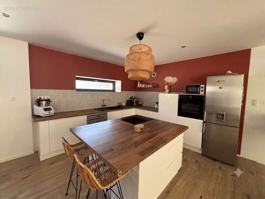 Maison 115 m² à Saint-Priest  - photo 2