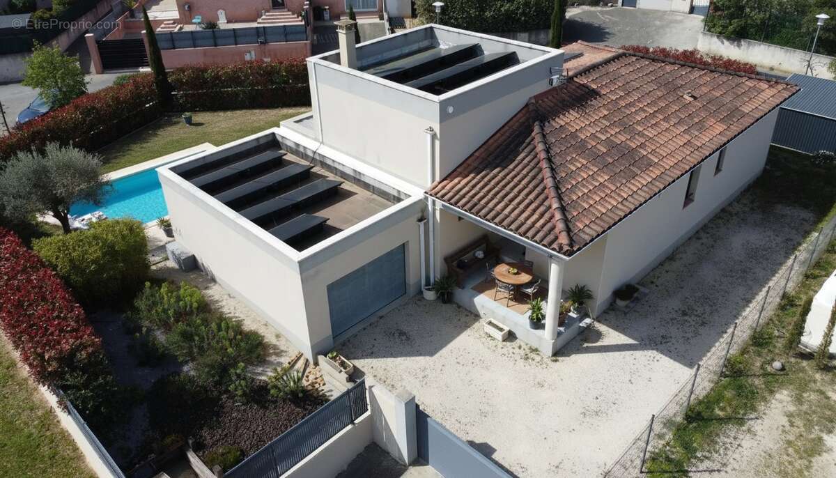 Maison à SAINT-LAURENT-DES-ARBRES