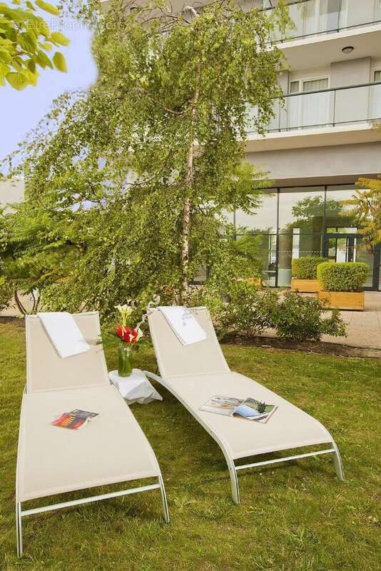 INVESTISSEMENT LOCATIF  CARRIÈRES-SUR-SEINE  Résidence d'Affaires Residhome Carrières La Défense - 7.14% de rentabilité - photo 15