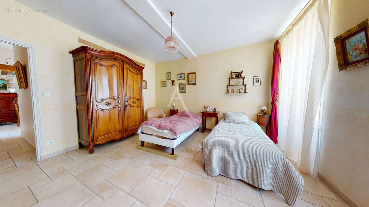 Maison familiale 8 pièces - 206 m2 - Centre ville de Neuville-aux-bois - photo 7