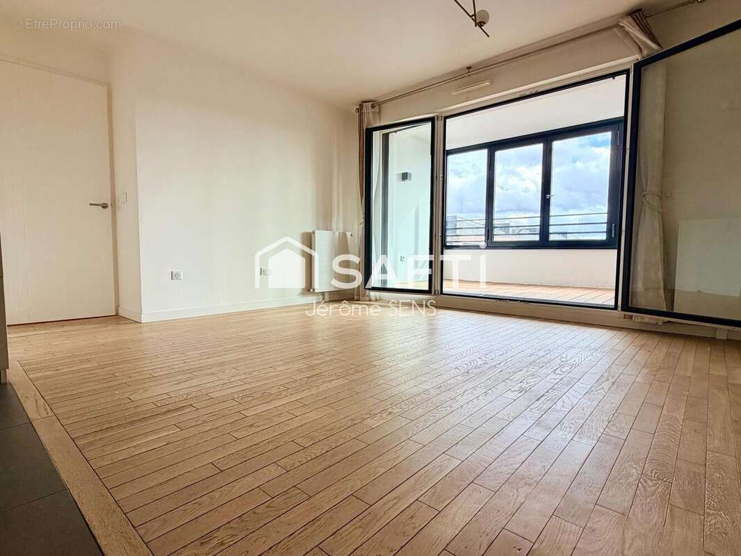 Photo 6 - Appartement à COURBEVOIE