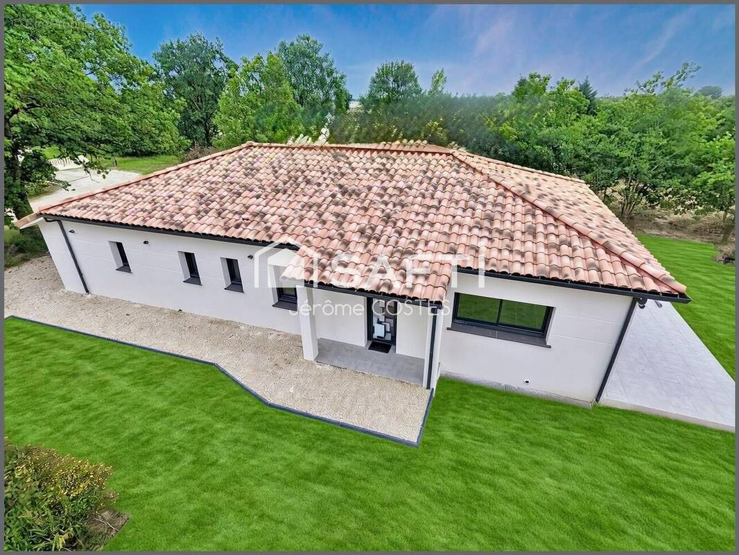Photo 1 - Maison à MONTBETON