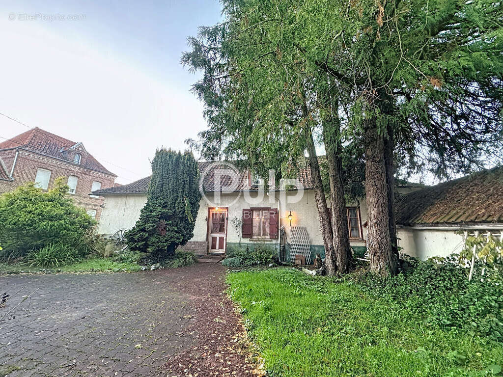 Maison à AUBROMETZ