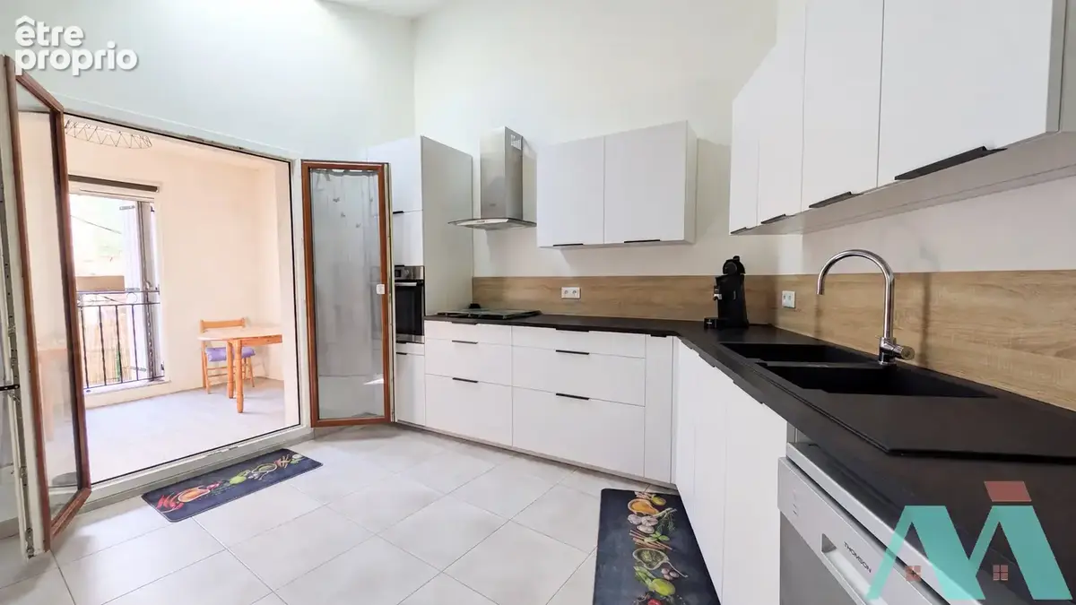 Appartement T4 de 136m2 entièrement rénové - photo 3