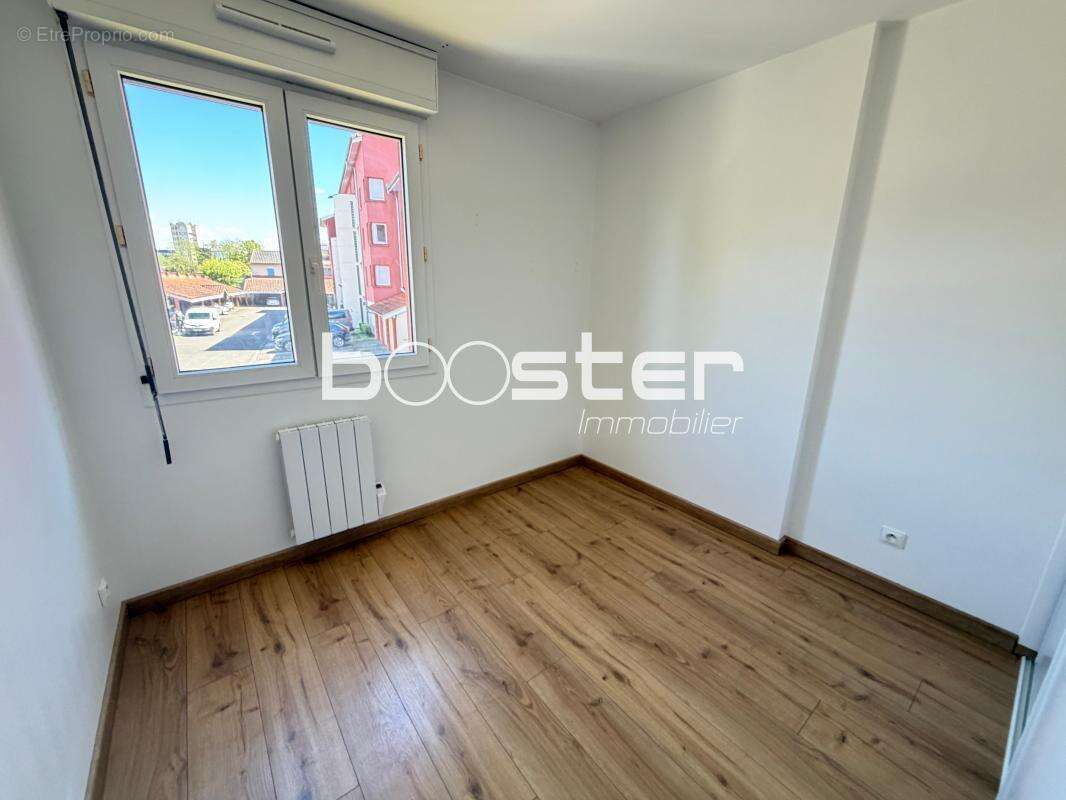 Bonnefoy- Bel appartement T4 avec balcon, parking et cave, au calme - photo 4
