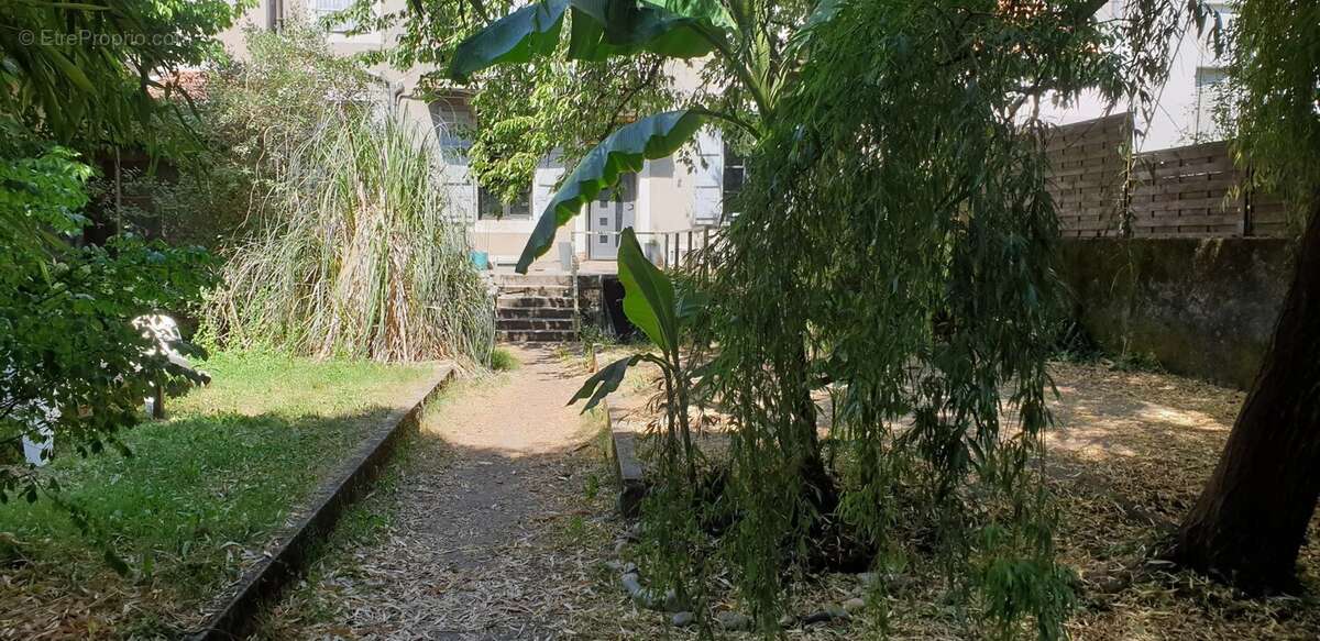 Maison centre ville avec jardin - photo 10