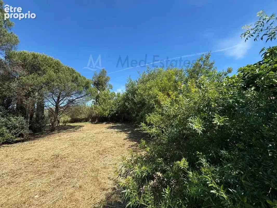 Terrain constructible avec permis purgé - emplacement central - photo 4