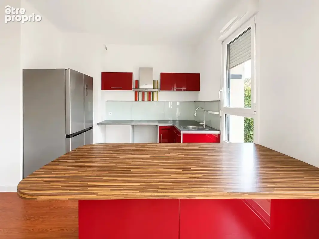 Appartement F3 de 62 m² avec jardin privatif et place de parking sécurisée - photo 3