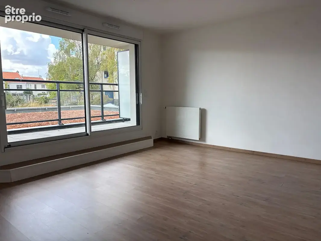 Appartement T3 de 60.80 m² avec deux belles terrasses et un parking - photo 4