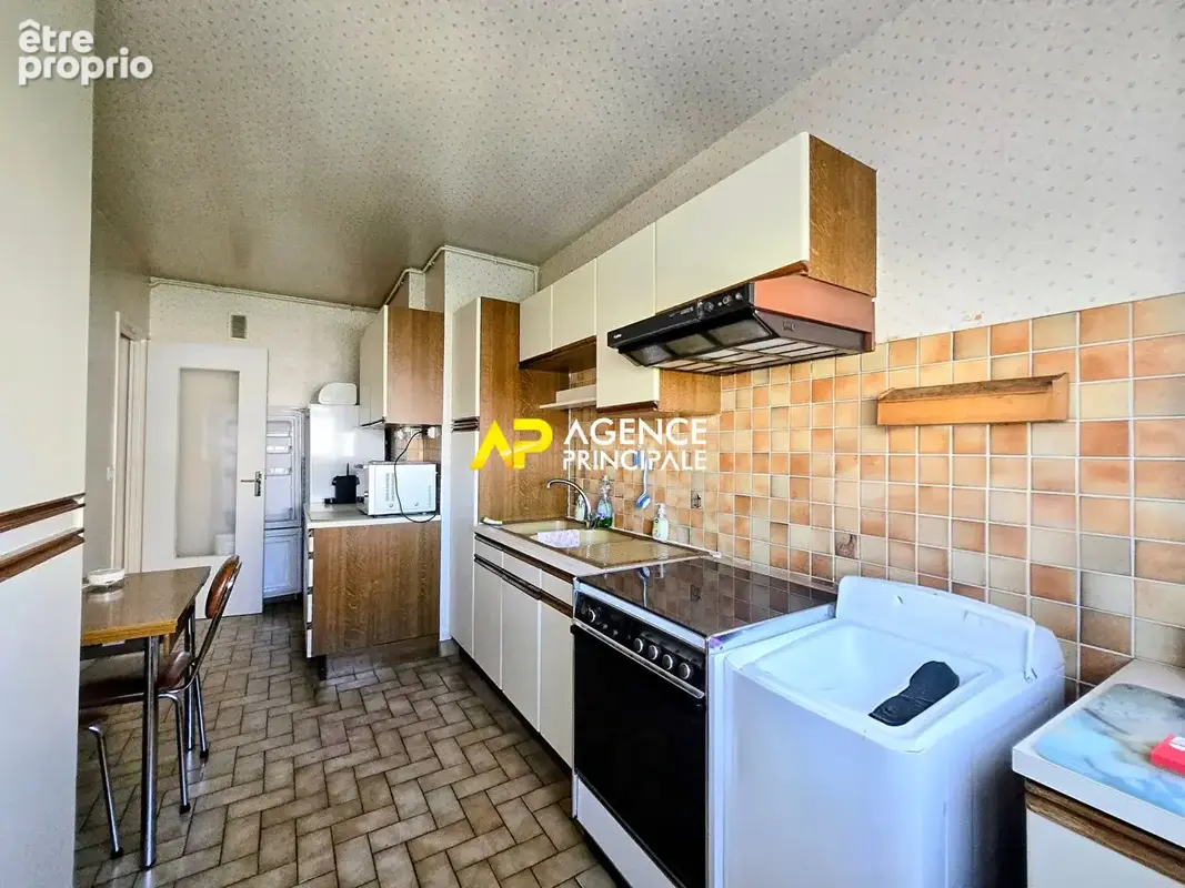 Appartement 4 pièces avec balcon, caves et parking à 12 minutes de la gare du centre ville - photo 3