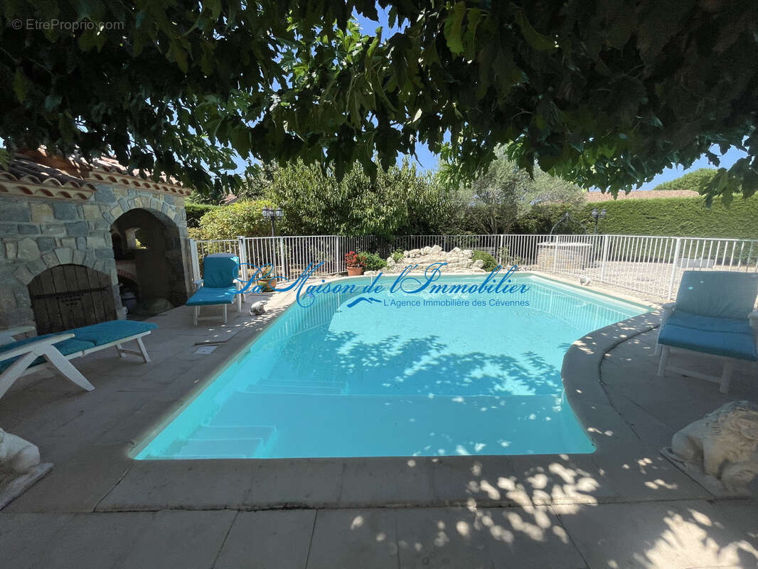 SAINT CHRISTOL LES ALES, en fond d'impasse, charmante villa de tpe F66 de 148 m2 hab avec piscine et garage de - photo 12
