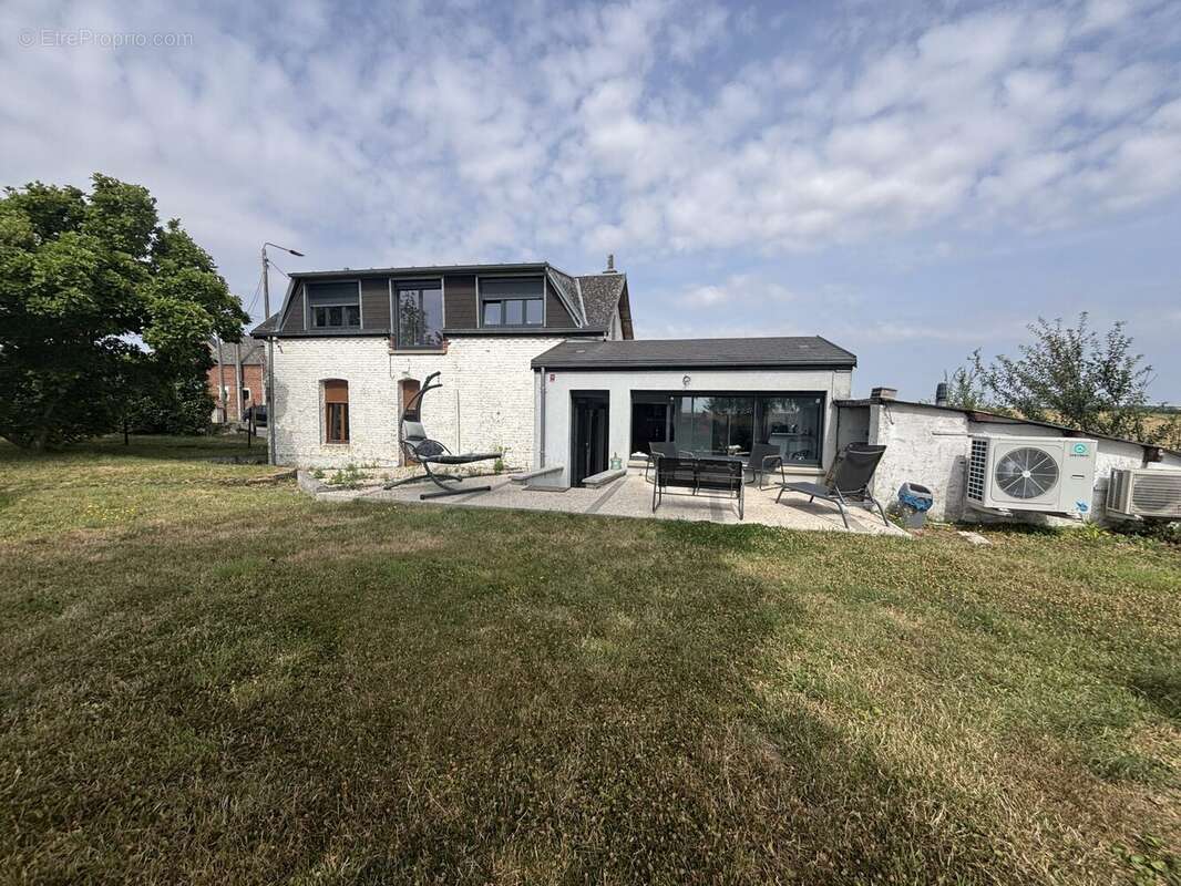 Maison 91 m² à Solesmes  - photo 2
