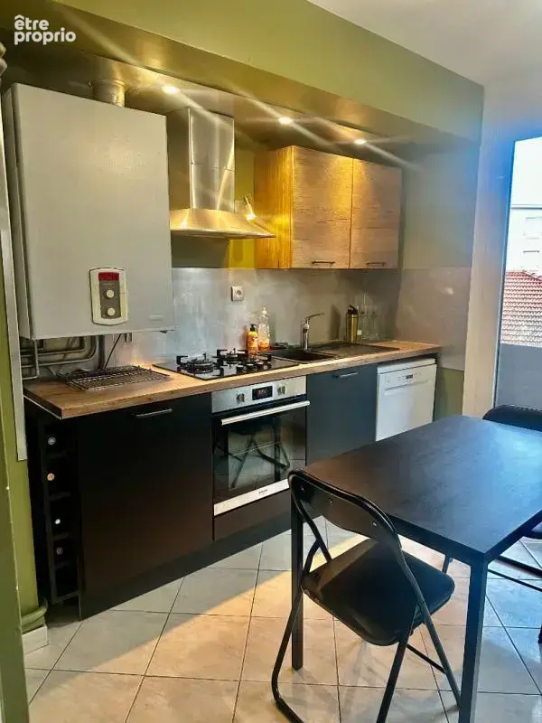 ROANNE Appartement 4 pièces avec balcons et cave - photo 2