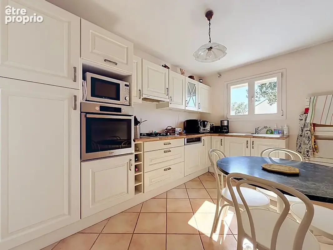 Maison 6 pièces 112 m² à vendre à Coignieres (78310) - photo 3