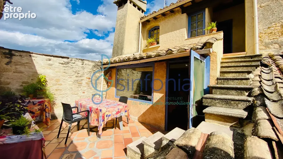 Remoulins maison de village en pierre de 280 m2  terrasses et cours idéal projet familial, gîtes ou investisse - photo 2