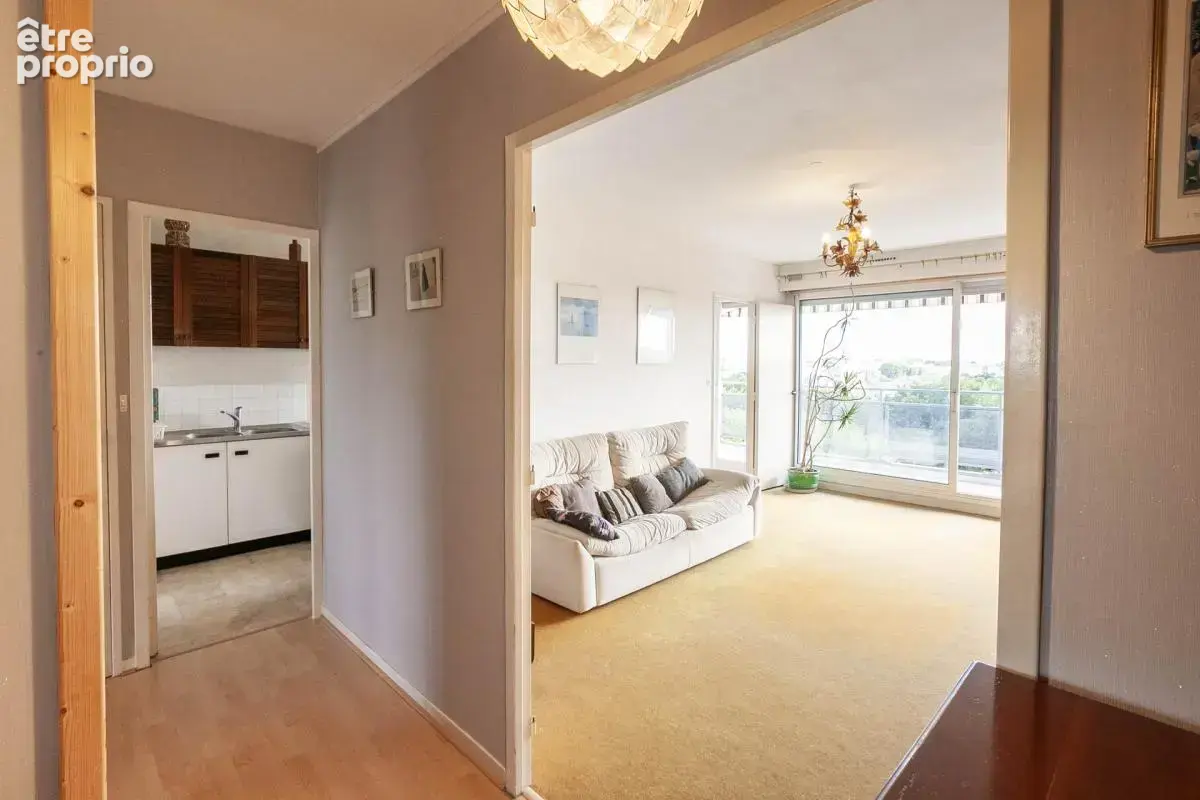Appartement T3 72m² avec balcon plein sud - Box en sous-sol - photo 4
