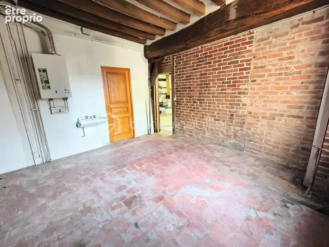 Ensemble immobilier (local commercial + appartement) plein centre ville - photo 12