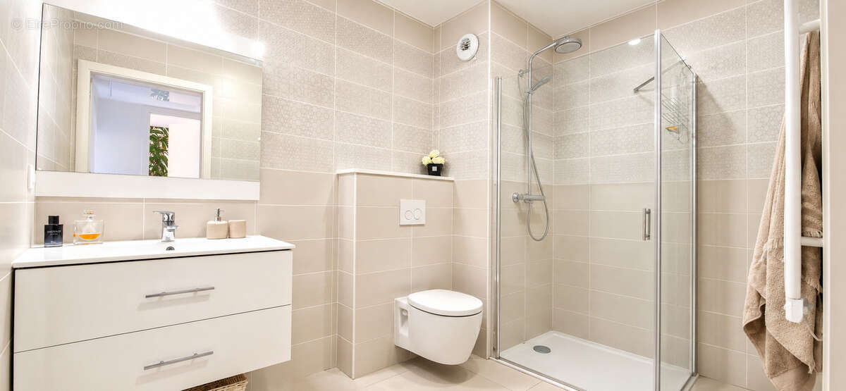 EXCLUSIVITE - Grand 2 pièces en rez de jardin + garage - photo 6
