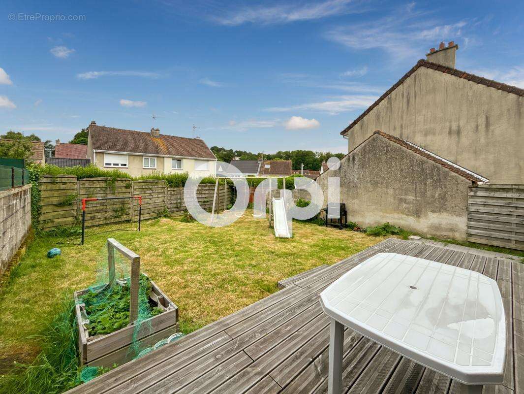 Pont de briques -  À Vendre : Ravissante Maison Semi-Mitoyenne à Saint-Étienne-au-Mont - photo 11