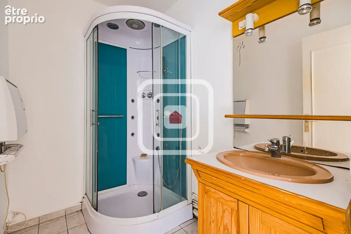 Appartement t5 avec 3 chambres balcon grand garage cave - photo 5