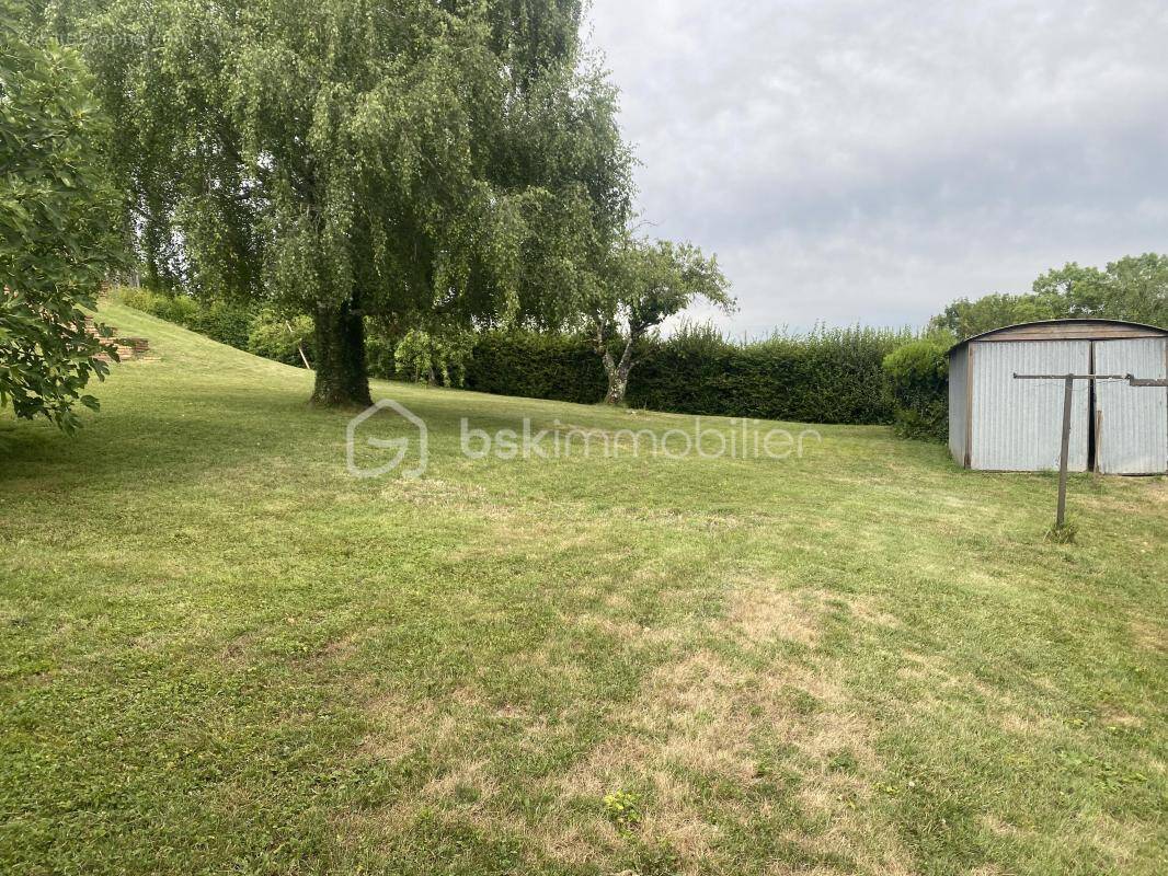 Terrain à VILLIEU-LOYES-MOLLON