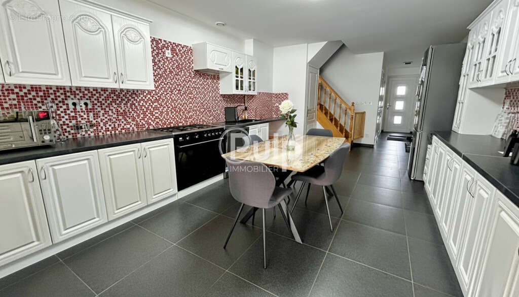 Maison à COURRIERES