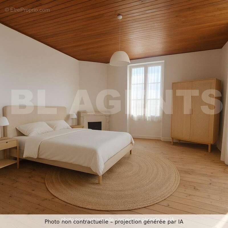 A_photograph_showcases_a_spacious_bedroom_during_d_avec_mention (1) - Maison à MOISSAC
