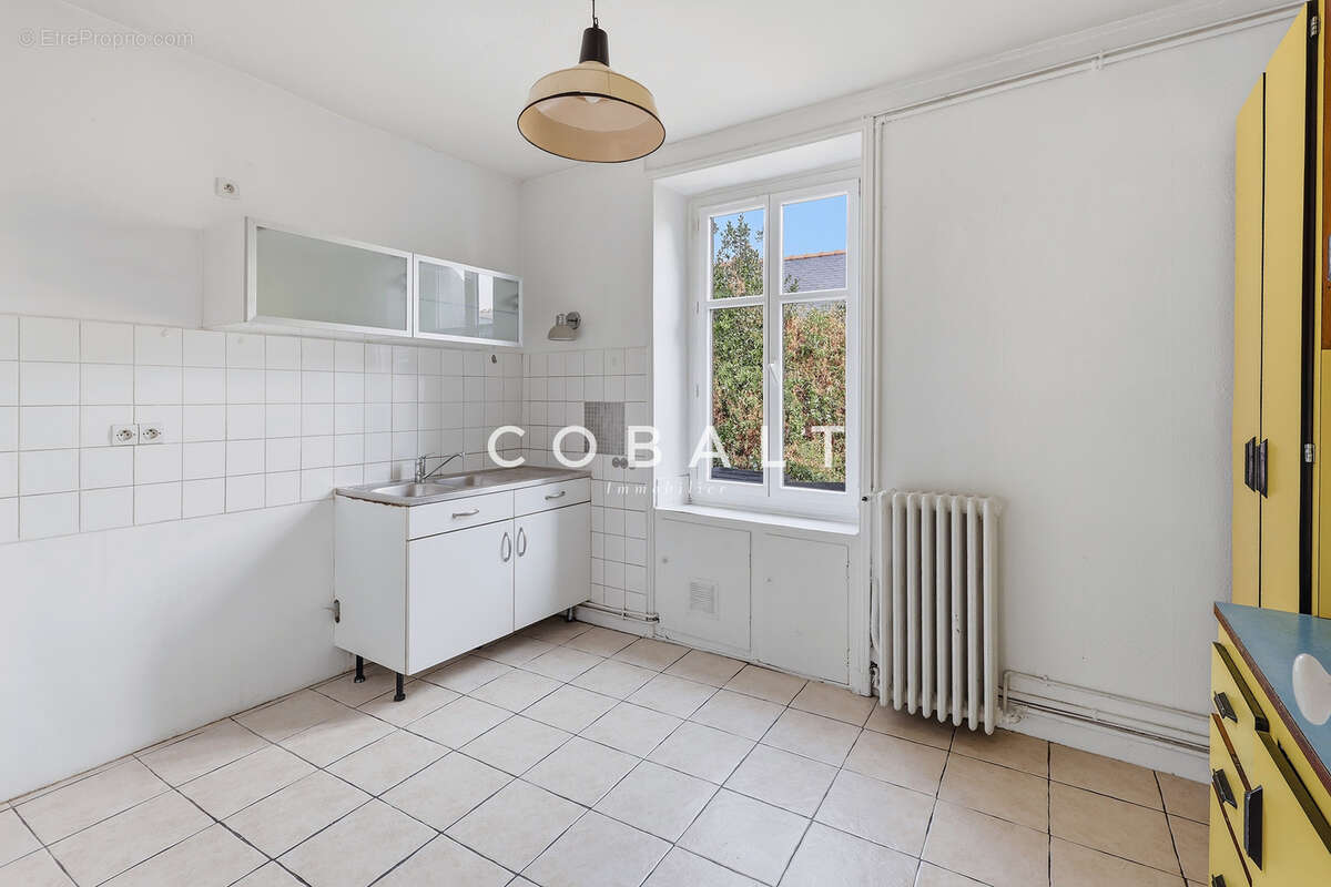 À deux pas du marché Talensac, un appartement de caractère à réinventer - photo 6