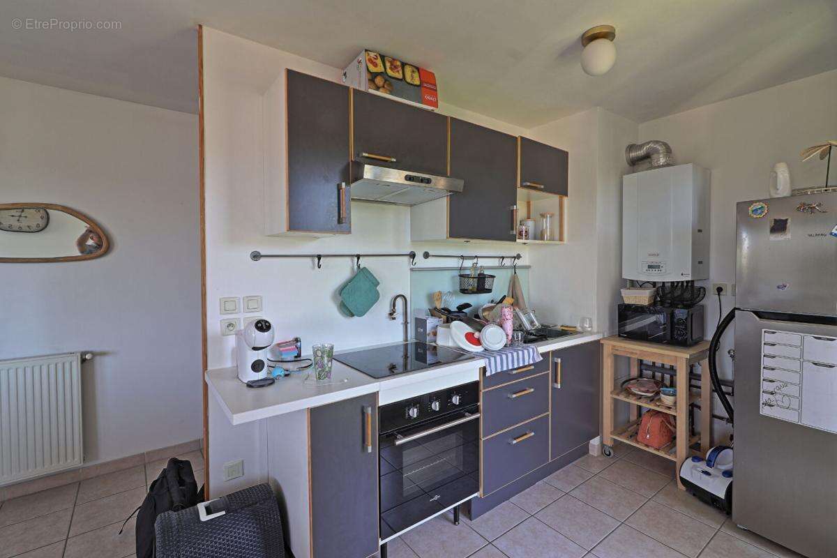Appartement T2 Bourgoin Jallieu, 48 m² + garage et parking - photo 4