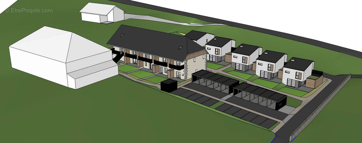 Garage du batiment - Maison à LA MOTTE-SERVOLEX