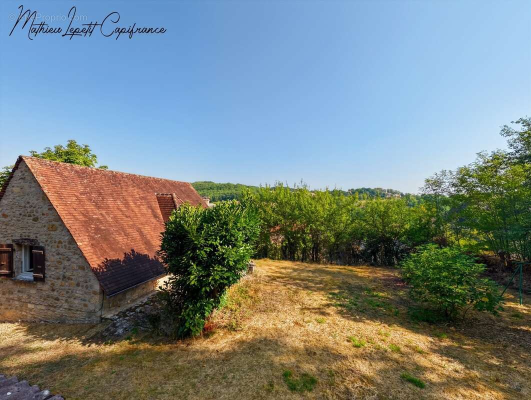 Maison en pierre apparente à vendre 3 pièces LA BACHELLERIE (24)  72 m² – 2 chambres – terrain 1744 M² - photo 2