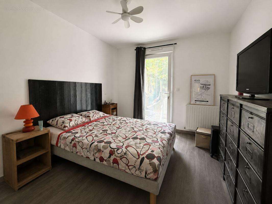 Maison plain-pied - 2 chambres - 64 m² - garage - jardin - photo 4