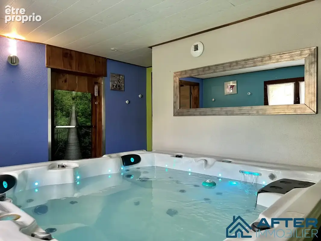 Maison 118 m² à Anould  - photo 7