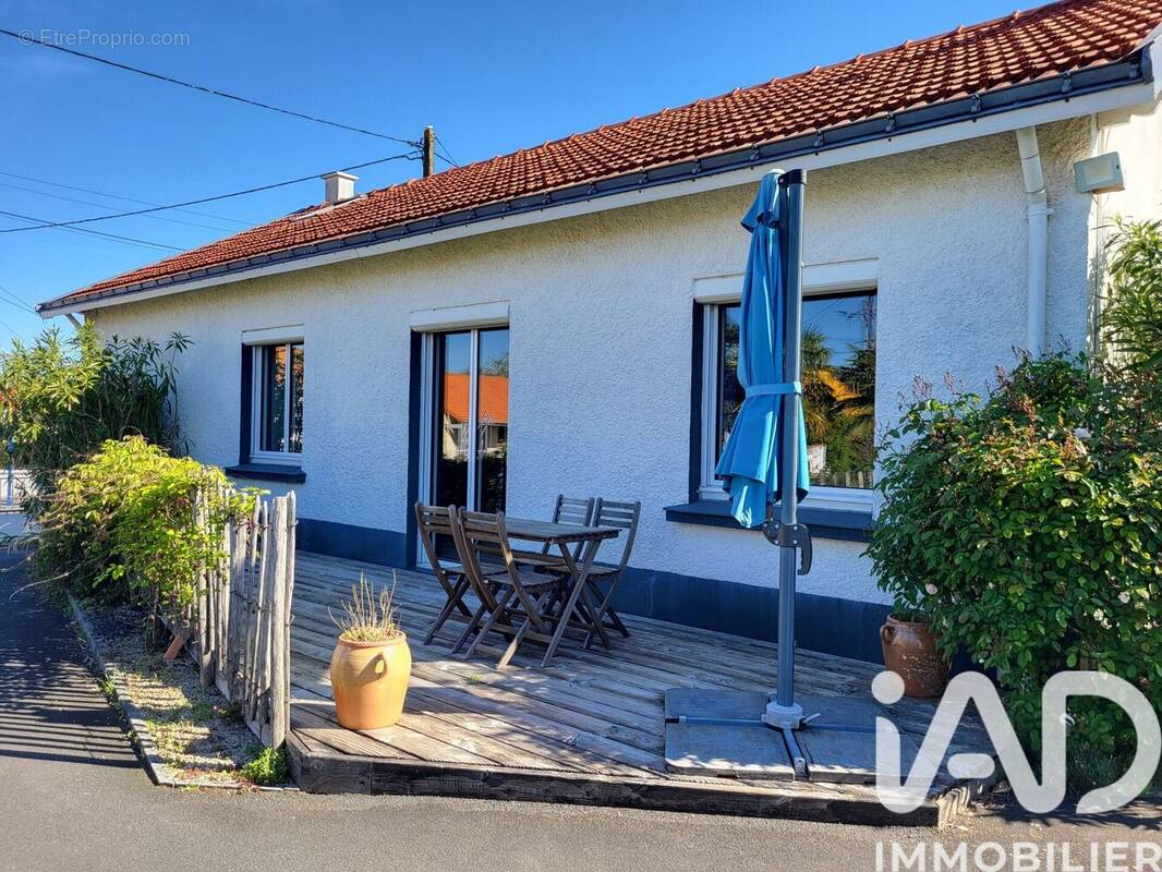 Photo 1 - Maison à BOUGUENAIS