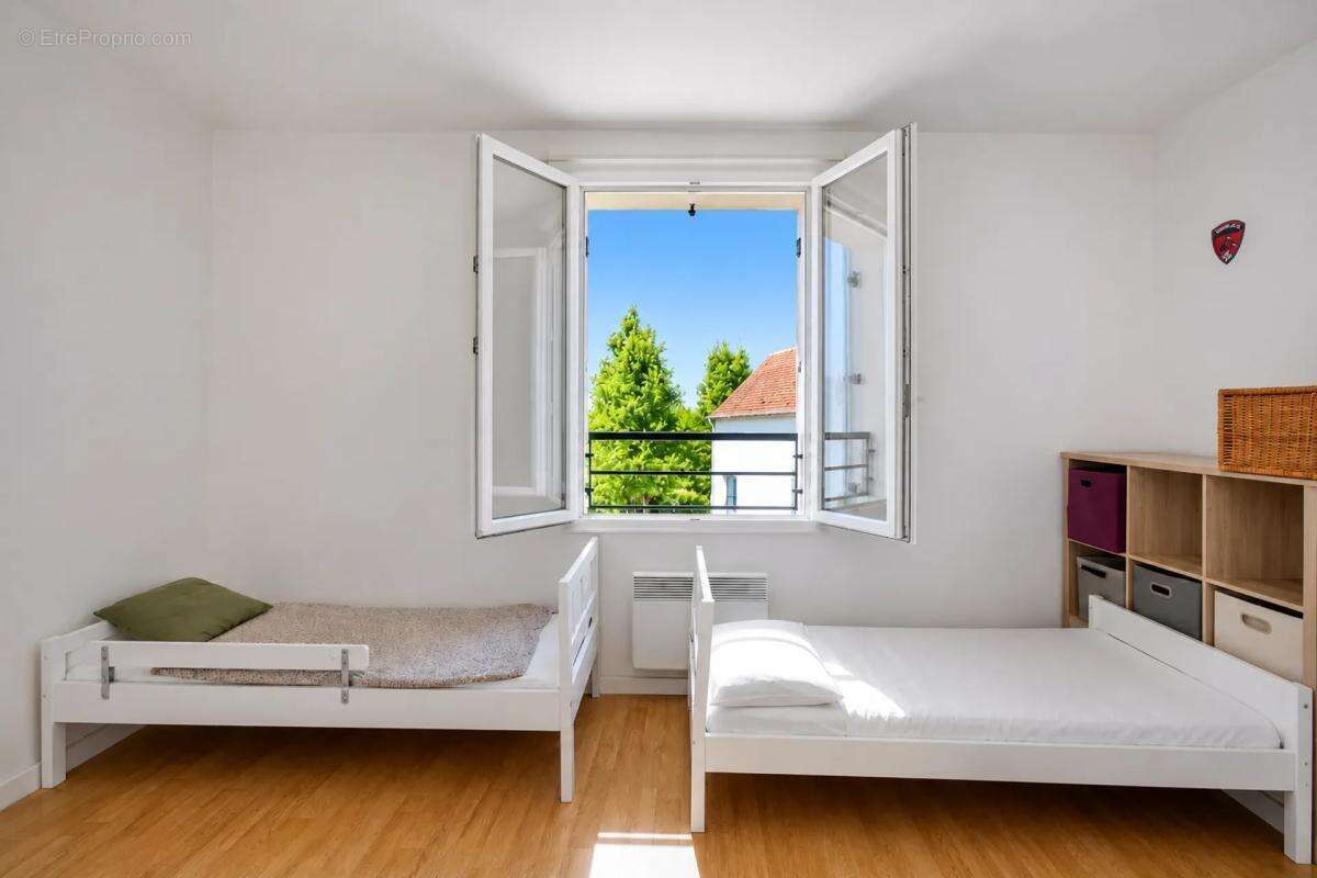 Appartement de 4 pièces de 74 m² situé à Chessy - photo 5