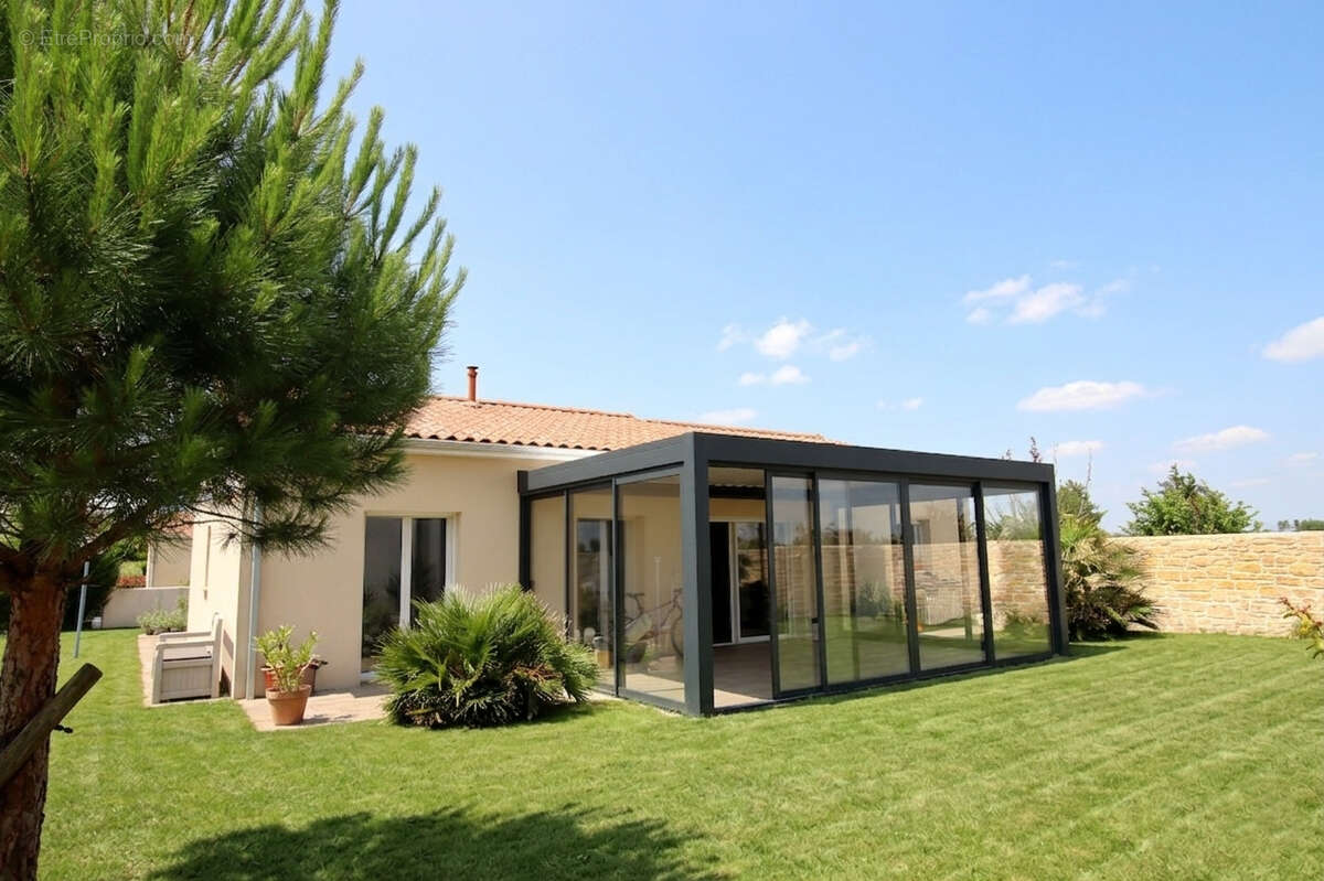 Maison de plain-pied à Vouillé - photo 3