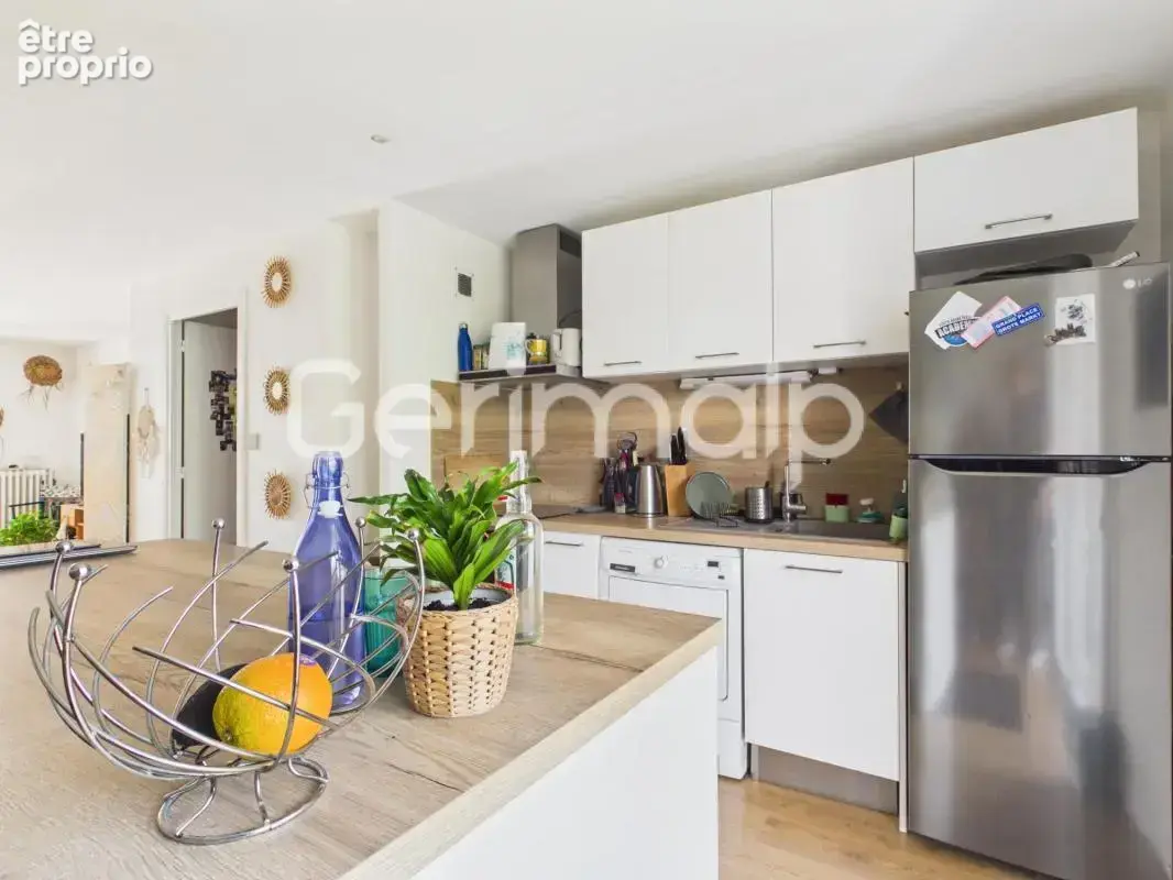 Vente - Appartement - 3 pièces + cuisine - 73 m² - 356 900 € - - photo 5