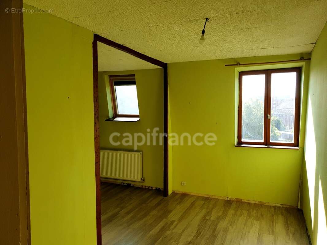 Maison de 1930 pleine de charme avec jardin, terrasse couverte et 4 chambres à Valenciennes (59) - photo 20