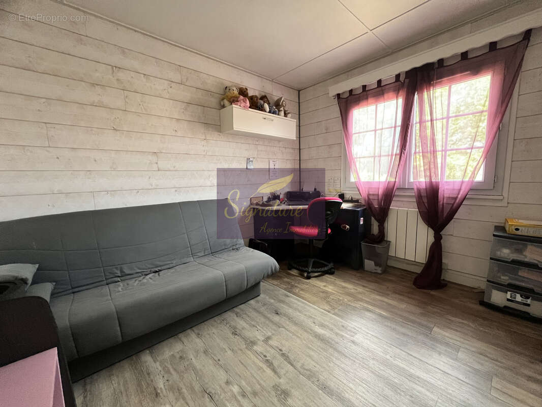 Maison familiale en ossature bois de 145 m2, quatre chambres.  Terrain de 1824 m2 garage double. - photo 12