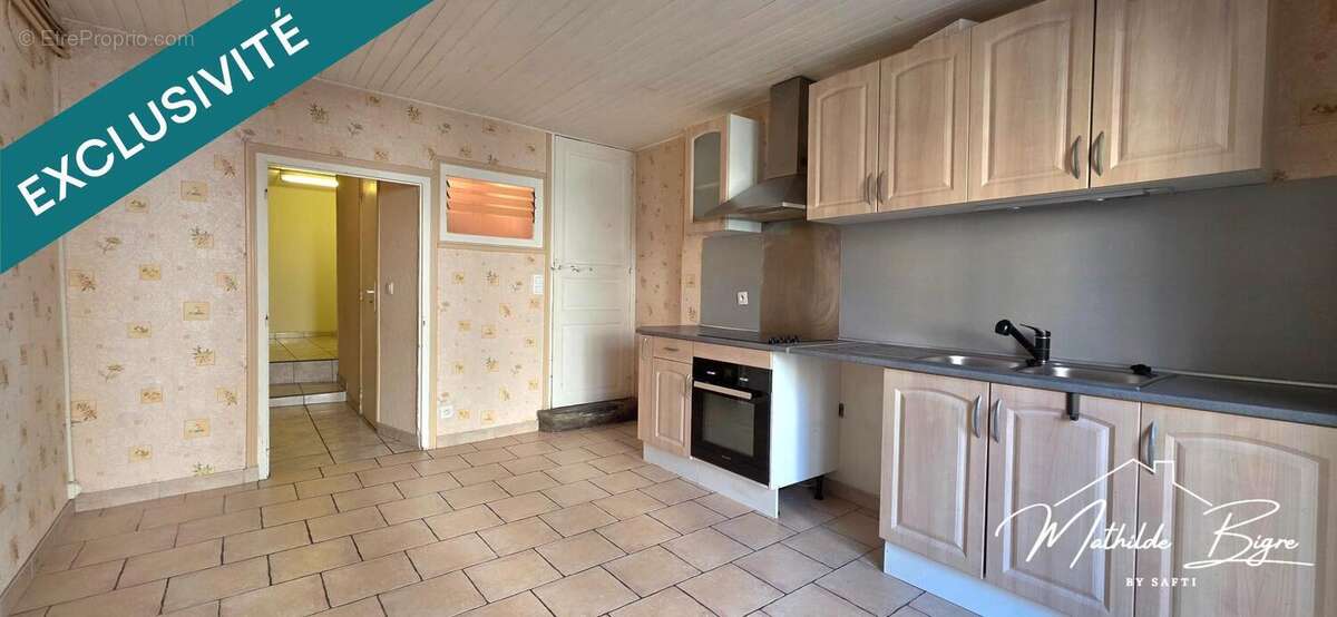 Photo 2 - Maison à SAINT-GERMAIN-LEMBRON