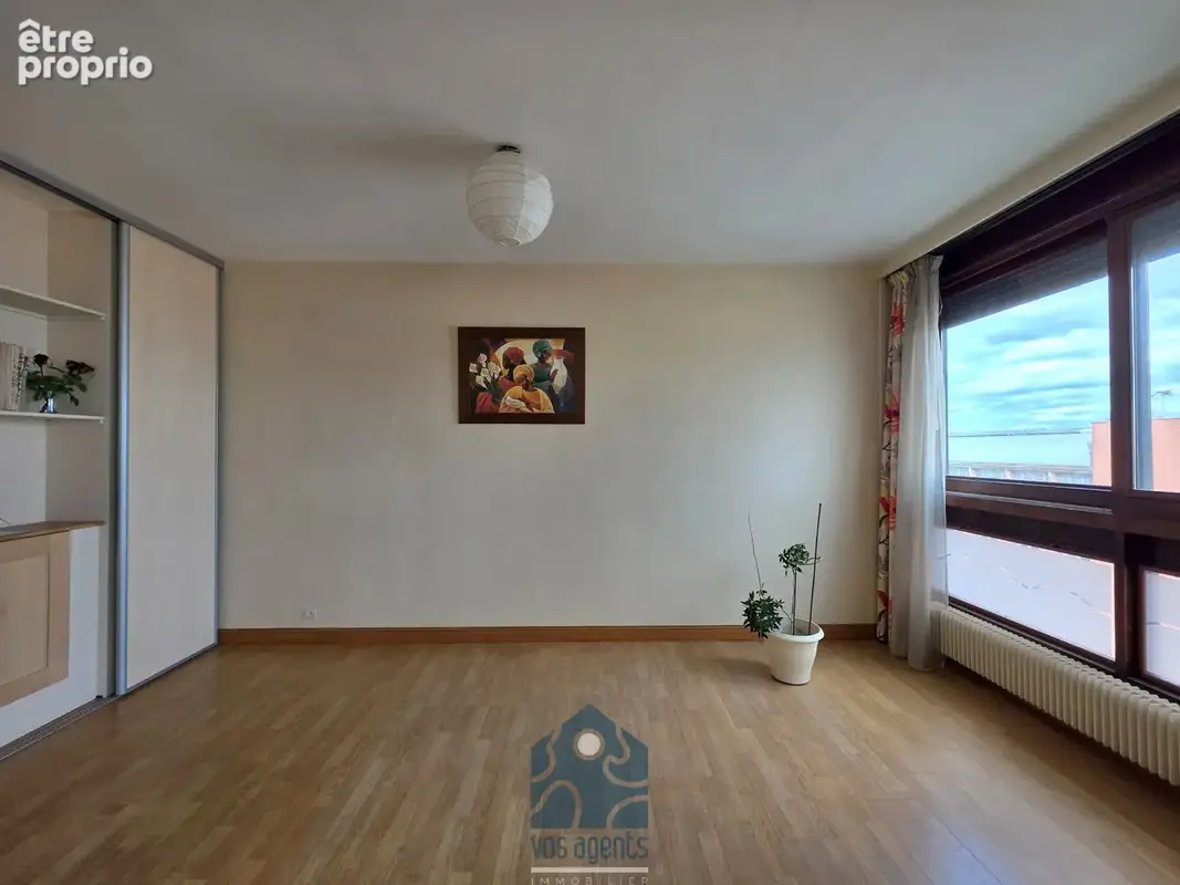 Appartement 4 pièces avec balcon, cave et stationnement couvert sécurisé - photo 2