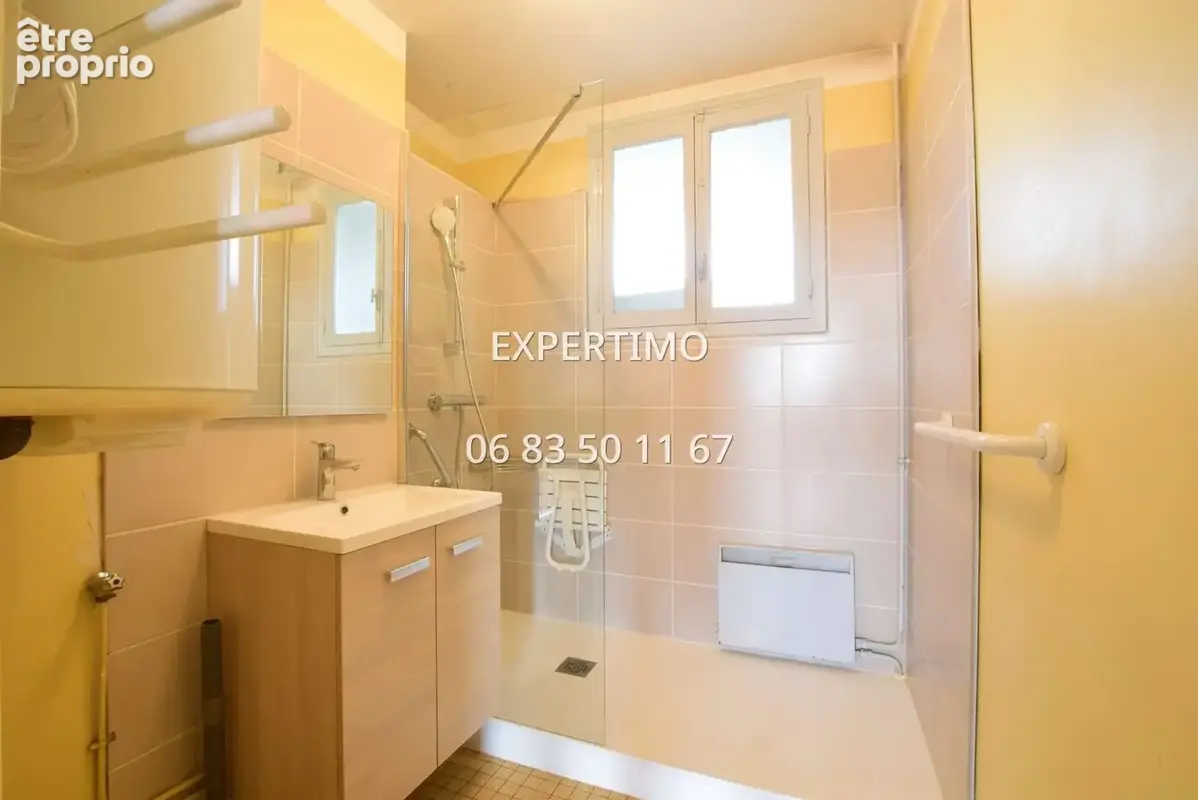 Appartement lumineux - 3 chambres poss. 4 - fort potentiel - photo 11